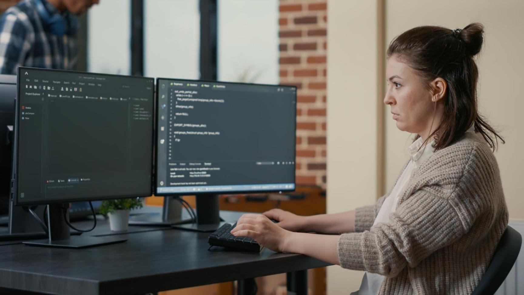 Instructor demonstrating game development techniques during hands-on workshop session